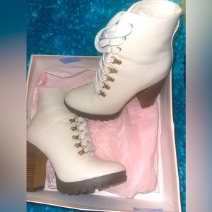 Cute bootie from just fab worn once. I scratched them but  they are cute